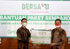 Grab Kembali Salurkan Paket Sembako untuk Warga Terdampak Pandemi
