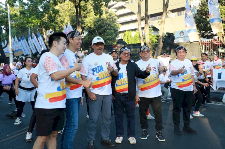 Komjen Pol (P) Nana Sudjana AS, MM, saat menghadiri Central Java Fun Walk yang digelar Kadin dalam rangka HUT ke-55. Menurut Nana, kegiatan sport tourism terbilang berhasil mendatangkan wisatawan masuk ke Jawa Tengah. 