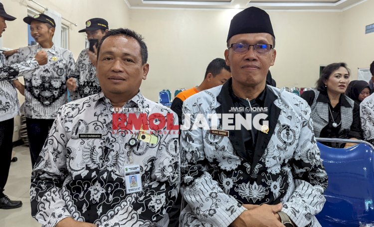 Calon Ketua PGRI Banjarnegara terpilih, Heling Suhono (kanan) dengan calon pengurus PGRI suara tertinggi di F2, Doko Harwanto (kiri). Arief Ferdianto/RMOLJateng